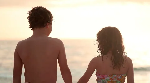Young children at beach Stock Footage 1003210