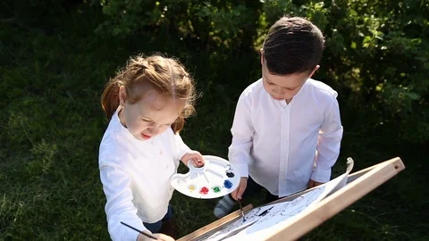 Young children in a field Stock Footage 108295406