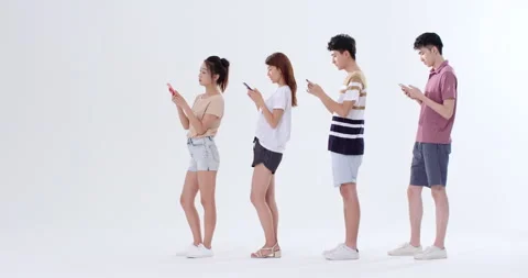 Young Chinese adults using smart phones,4K Stock Footage 246748838