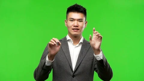 Young chinese business man showing number nine Stock Footage 97870053