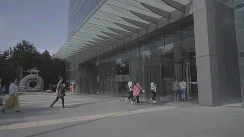 Young Chinese city workers going to office, Shanghai, China Stock Footage 113894809