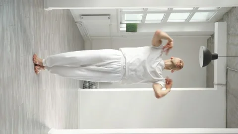 Young choreographer demonstrates elements of modern dance on camera Stock Footage 169224390