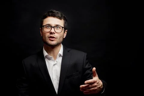 Young clever man is arguing logically. cute man with a powerful talking point Foto stock