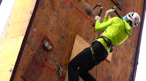 Young climber training to conquer the mountain. Motivation. Stock Footage 69032757