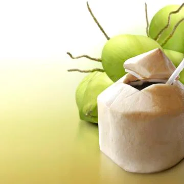 Young coconut on solid background Stock Photos