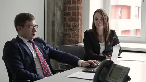Young colleagues are talking while sitting in leading company. Stock Footage 83150879