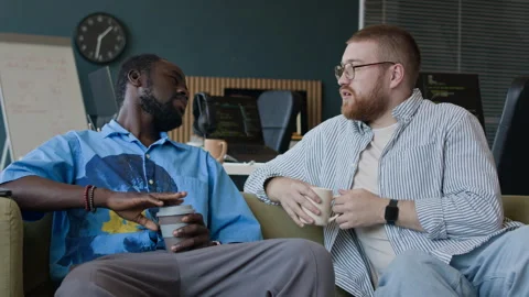 Young Colleagues Chatting During Coffee Break Stock-Footage 283212867