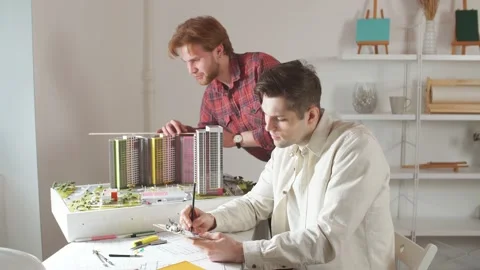 Young colleagues creating new ecologic neighbourhood Stock Footage 127779236