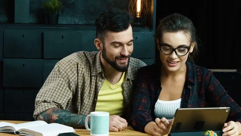 Young colleagues discussing ideas Stock Footage 92134889