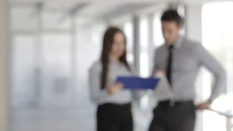 Young Colleagues Talking About Work Tasks Video stock 87395252