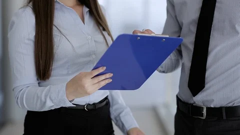 Young Colleagues Talking About Work Tasks Video stock 87395269