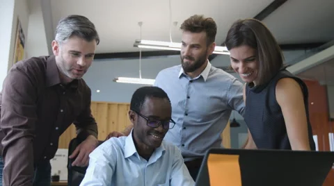 . Young colleagues working in the office Stock Footage 68360969