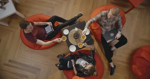 Young colleagues working together in cafe Stock Footage 111648065