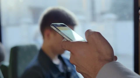 Young commuter texting a message Video stock 67105453