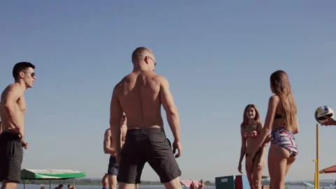 Young company on the beach is having fun Stock Footage 96366235