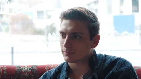 Young company is having fun and eating in bar. smoking a hookah, communicating Stock Footage 87200310