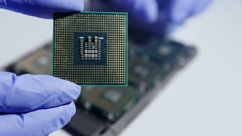 Young Computer Engineer is Holding and Inspecting Processor. 스톡 동영상 84323592