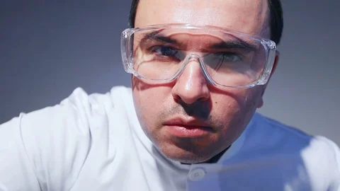 Young Computer Engineer is Holding and Inspecting Processor. 動画素材 84382863