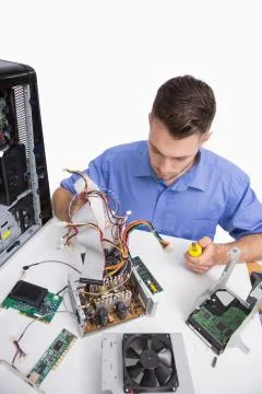 Young computer engineer working on cpu parts Stock Photos