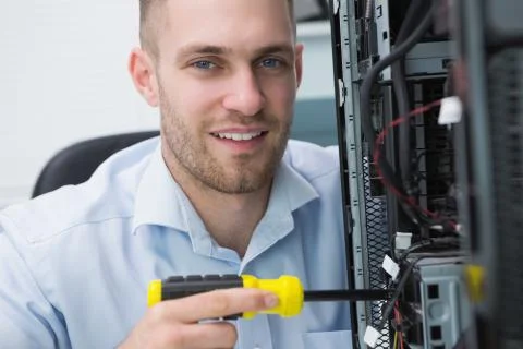 Young computer engineer working on cpu Foto stock