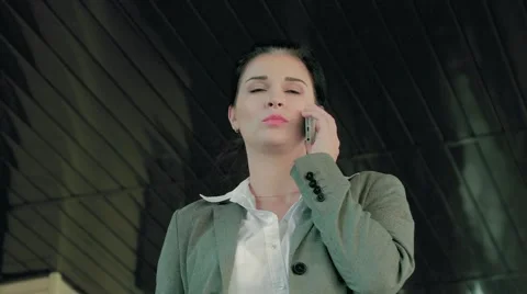 Young concentrated businesswoman doing business on the phone Stock Footage