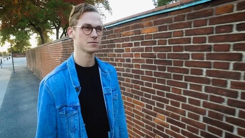 Young confident cool nerd hipster guy going to date Video stock 97091999
