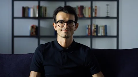 Young confident IT Manager looking at the camera, Smiling. Stock Footage 93260343