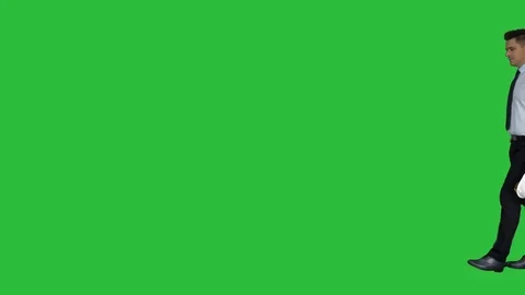 Young construction worker in hard hat on gray background on a Green Screen Stock-Footage 108578461