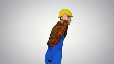 Young construction worker in hard hat dancing hip-hop on gradient background. Stock-Footage 130706255