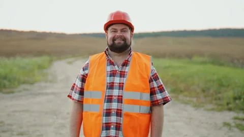 Young construction worker laughs Stock Footage 90885354