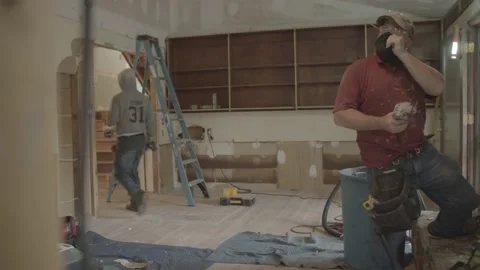 Young Construction worker walks through construction Stock Footage 146197901