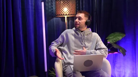 Young content creator recording podcast in a modern studio Stock Footage 328633691