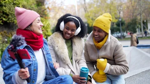 Young content creators recording urban interviews in winter Stock Footage 297064098