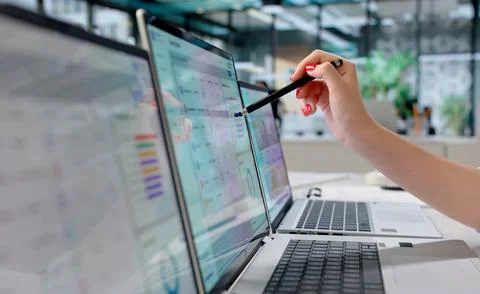 Young Corporate Training Manager Monitors Employee Progress On Multiple Scree Stock Photos