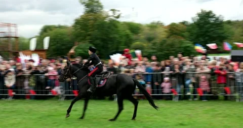 Young Cossacks galloping on horseback Stock Footage 66186190