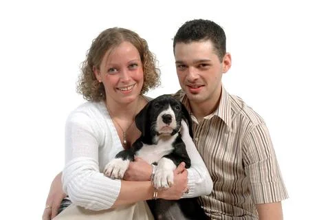 Young couple and puppy Stock Photos