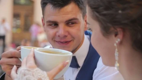 Young couple are drinking coffee Stock Footage 73273070
