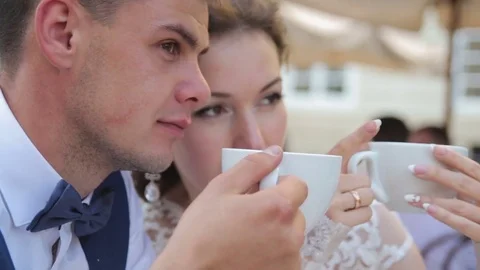 Young couple are drinking coffee Stock Footage 73273241