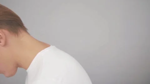 Young couple are sitting with their backs to each other Video stock 142564548