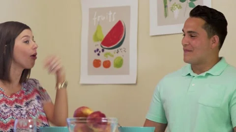 Young couple arguing in kitchen Video stock 64333834