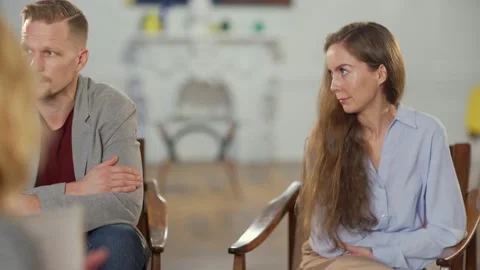 Young couple arguing at therapy session Stock Footage 142378122