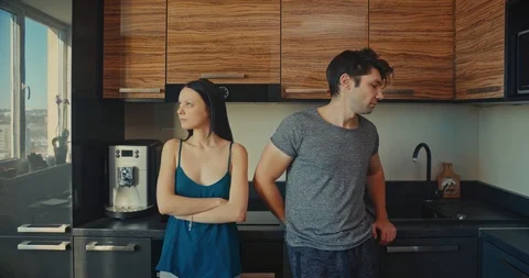 Young couple in an argument in a kitchen in the morning Stock Footage 101690960