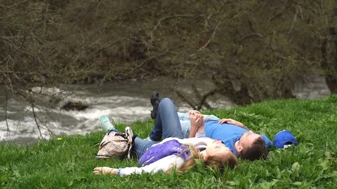 Young couple on the background of a mountain river in Georgia Stock Footage 76304612