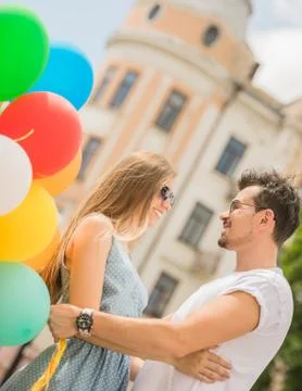 Young couple with balloons Stock Photos