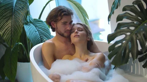 Young couple bathing in the bathroom Stock Footage 147677069