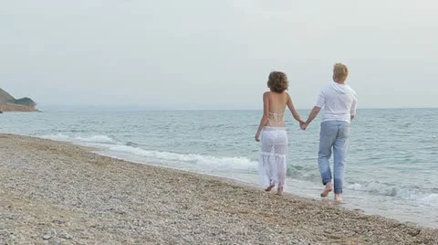 Young Couple On Beach Stock Footage 22277003