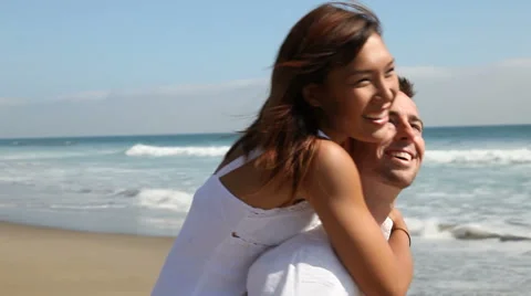 Young Couple On The Beach Stock Footage 41889170