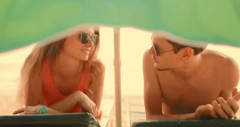 Young couple on the beach Stock Footage 105316260