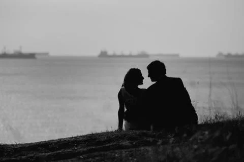 Young couple on the beach	 Stock Photos