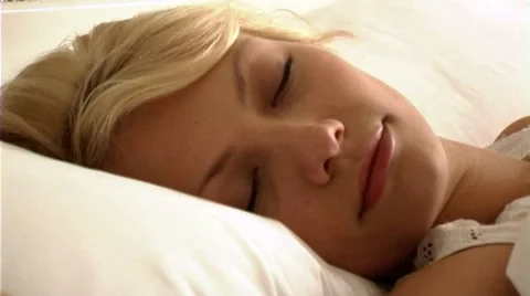 Young couple in bed Stock Footage 43699338